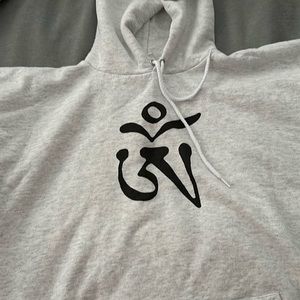 White “OM” hoodie. Medium